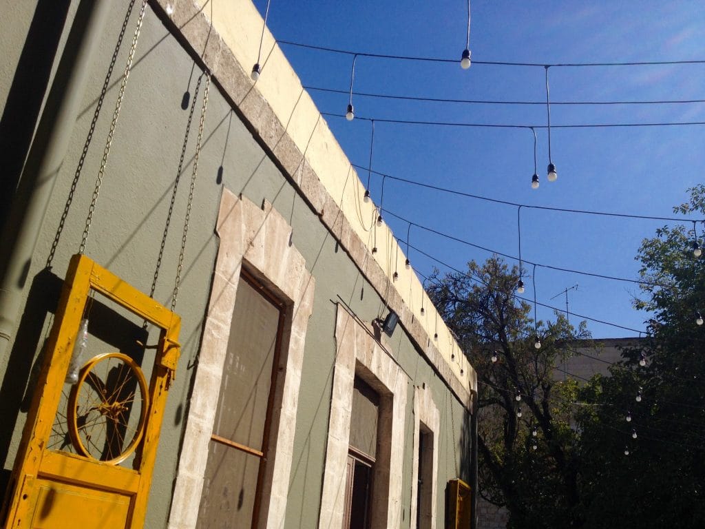 The private terrace, strung with lights