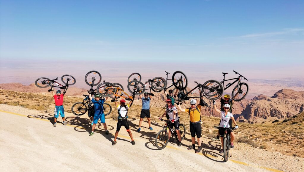 A group of cyclists with their bikes on the Jordan Bike Trail